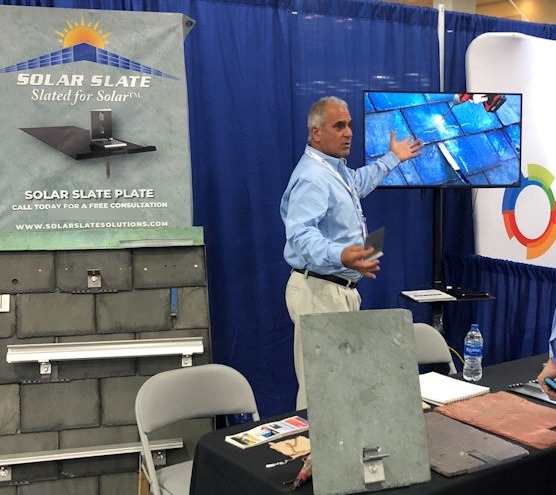 David Tomolillo, Founder of Solar Slate Solutions, presenting SlatePlate at a trade show